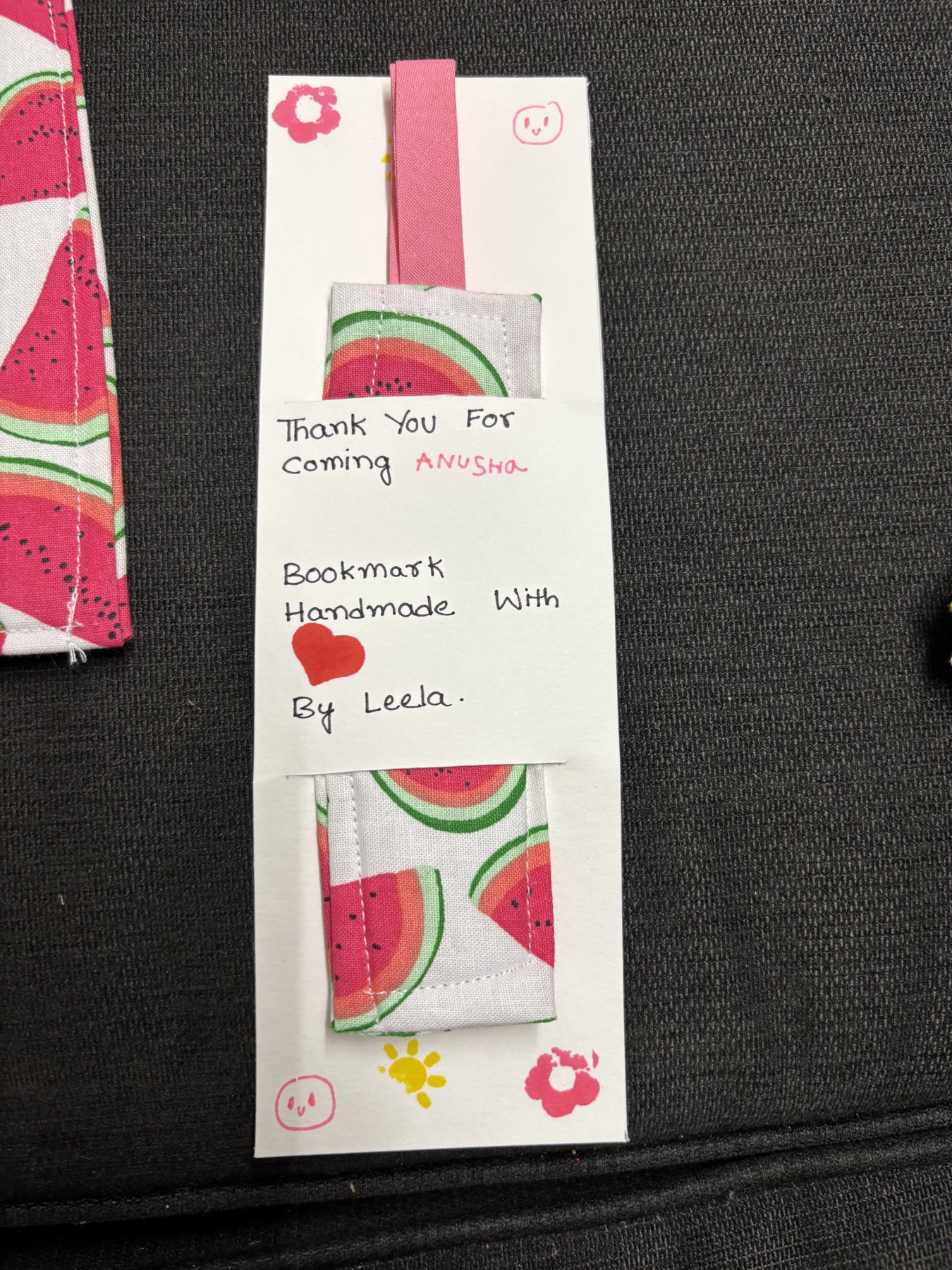A handmade watermelon-pattern bookmark with a thank-you note